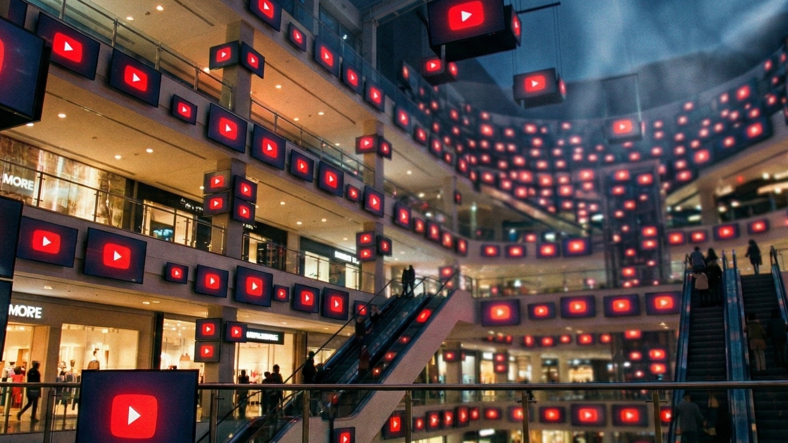 YouTube play button screens fill a shopping mall atrium, symbolizing platform's TV ad ambitions.