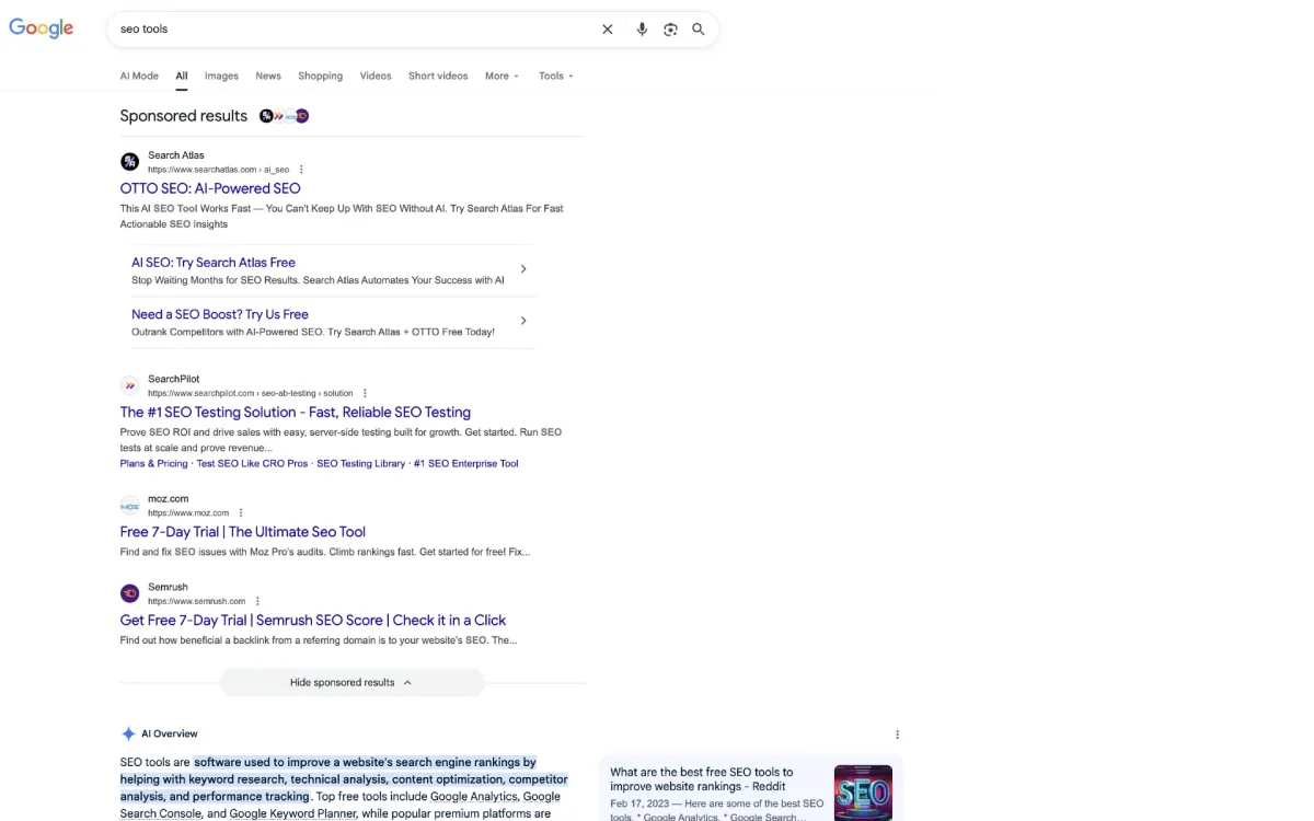 Google groups sponsored ads under single header in search results