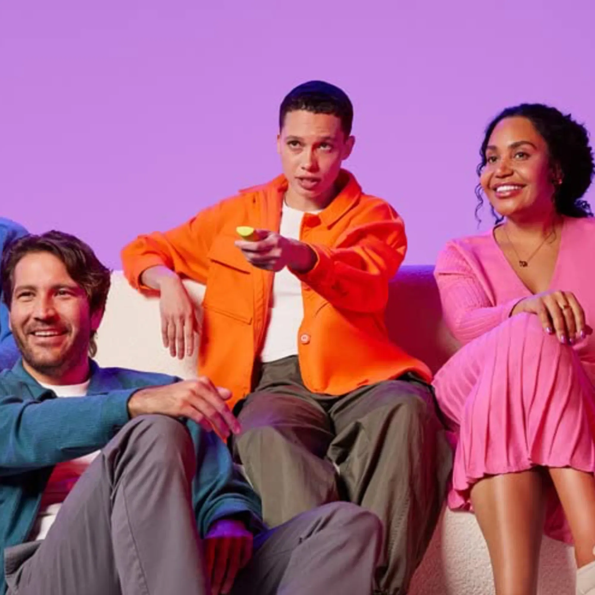 Four viewers on a couch - target audience for Amazon's new TV ad management platform.