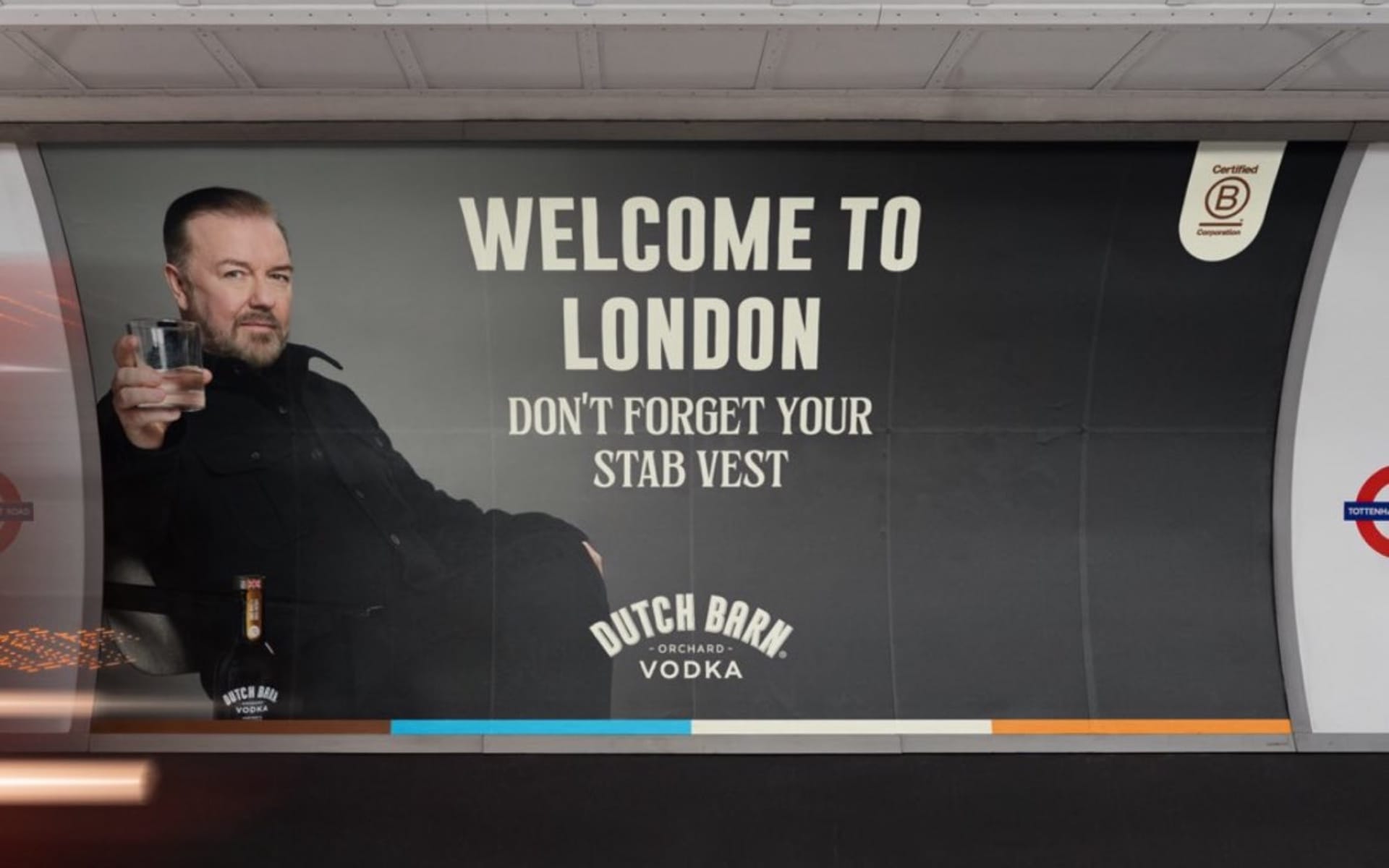 Ricky Gervais Dutch Barn vodka ad reading "Welcome to London don't forget your stab vest" on display