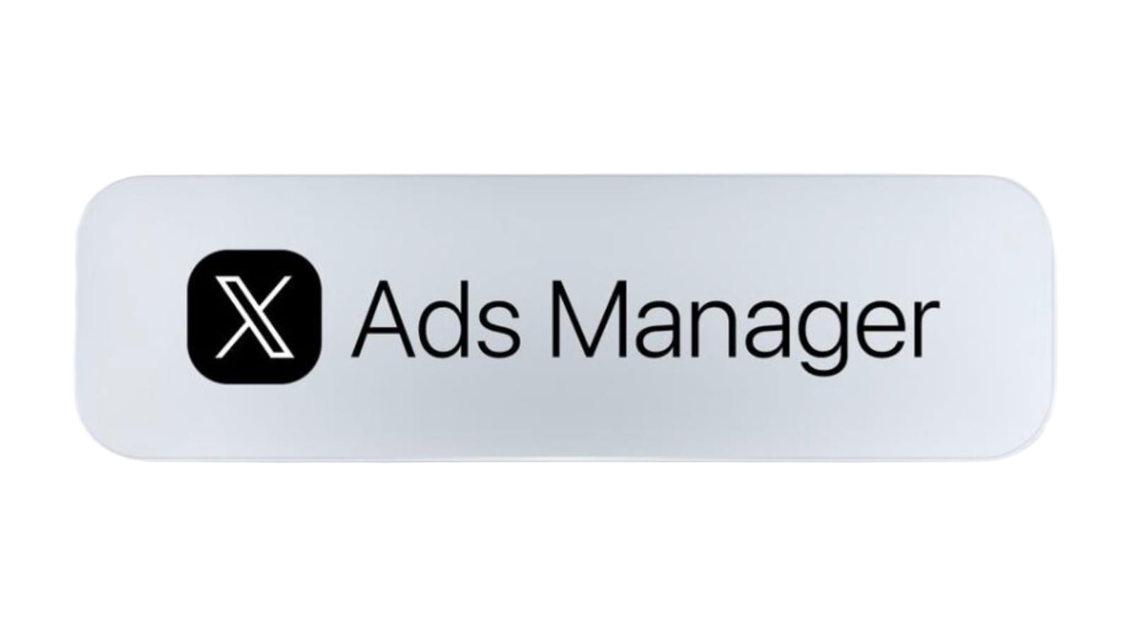 X Ads Manager logo on a silver pill badge, announced in the April 2026 platform rebuild.