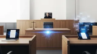 Modern federal courtroom with AI technology displaying legal citations and digital evidence on screens and tablets.