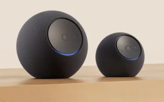 Amazon Echo Studio and Echo Dot Max with custom AZ3 silicon and blue light ring on wood surface