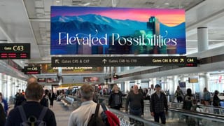 JCDecaux digital advertising display at Denver International Airport concourse C.