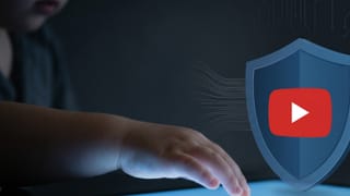 YouTube COPPA shield blocks data streams as child reaches toward screen, protecting privacy
