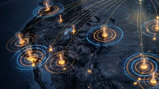 Broadcast towers across U.S. local markets emit signal rings, linking to national measurement grid