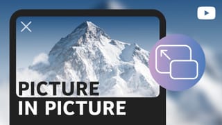 YouTube picture-in-picture floating video window on mobile with mountain landscape background