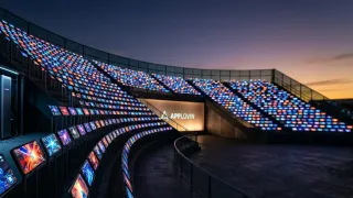 AppLovin Axon platform mobile gaming ad screens stadium arena dusk Q1 2026