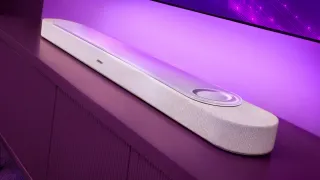 Bose Smart Soundbar with Alexa+ integration glowing purple in a living room setup