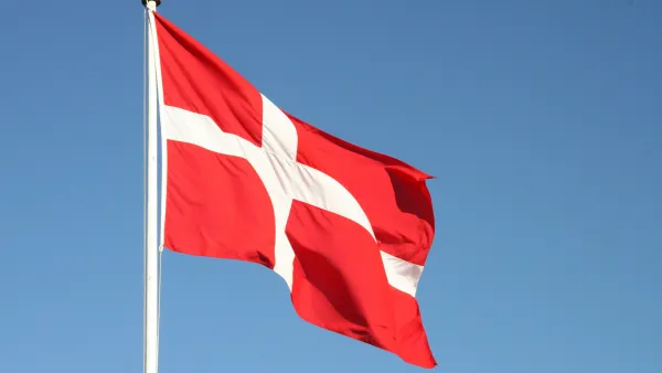 Danish flag symbolizing Denmark's leadership as first EU nation to implement AI Act legislation.