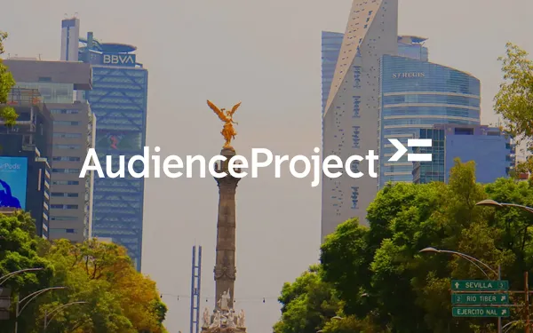 AudienceProject logo overlaid on Mexico City skyline featuring Angel of Independence monument and modern office buildings.
