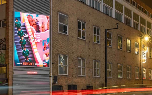 London Lites digital screen displaying Netflix Squid Game advertisement in central London location