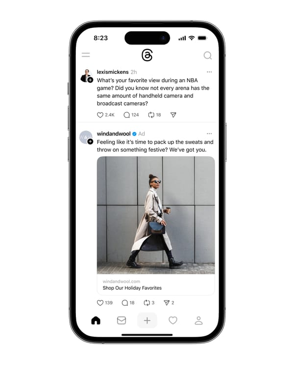 Threads mobile interface showing sponsored advertisement from Wind and Wool between organic posts