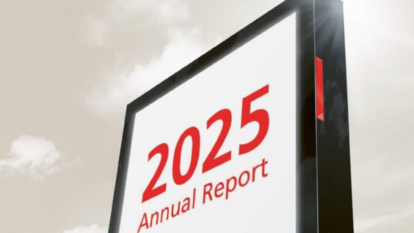 APG|SGA 2025 Annual Report cover displayed on an outdoor advertising billboard panel.