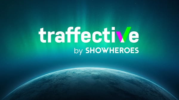 Traffective by ShowHeroes logo against a glowing planet horizon, announcing the 2026 acquisition.