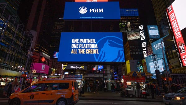 OUTFRONT digital billboard displays PGIM ad in Times Square, New York City at night.