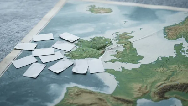 Blank corporate cards converge on Ireland on a relief map of Europe, showing GDPR jurisdiction.